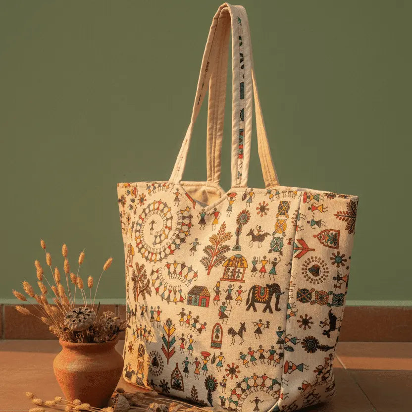 Vibrant multicolour Warli folk art print detail – cream cotton tote bag by Velunor